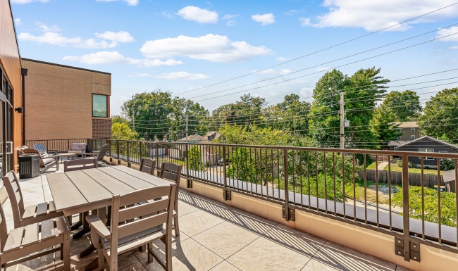 balcony with table and chairs
