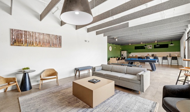 resident lounge with a couch and coffee table
